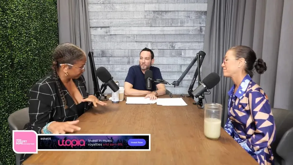 A podcast studio with a lower-third banner ad in the bottom-left corner